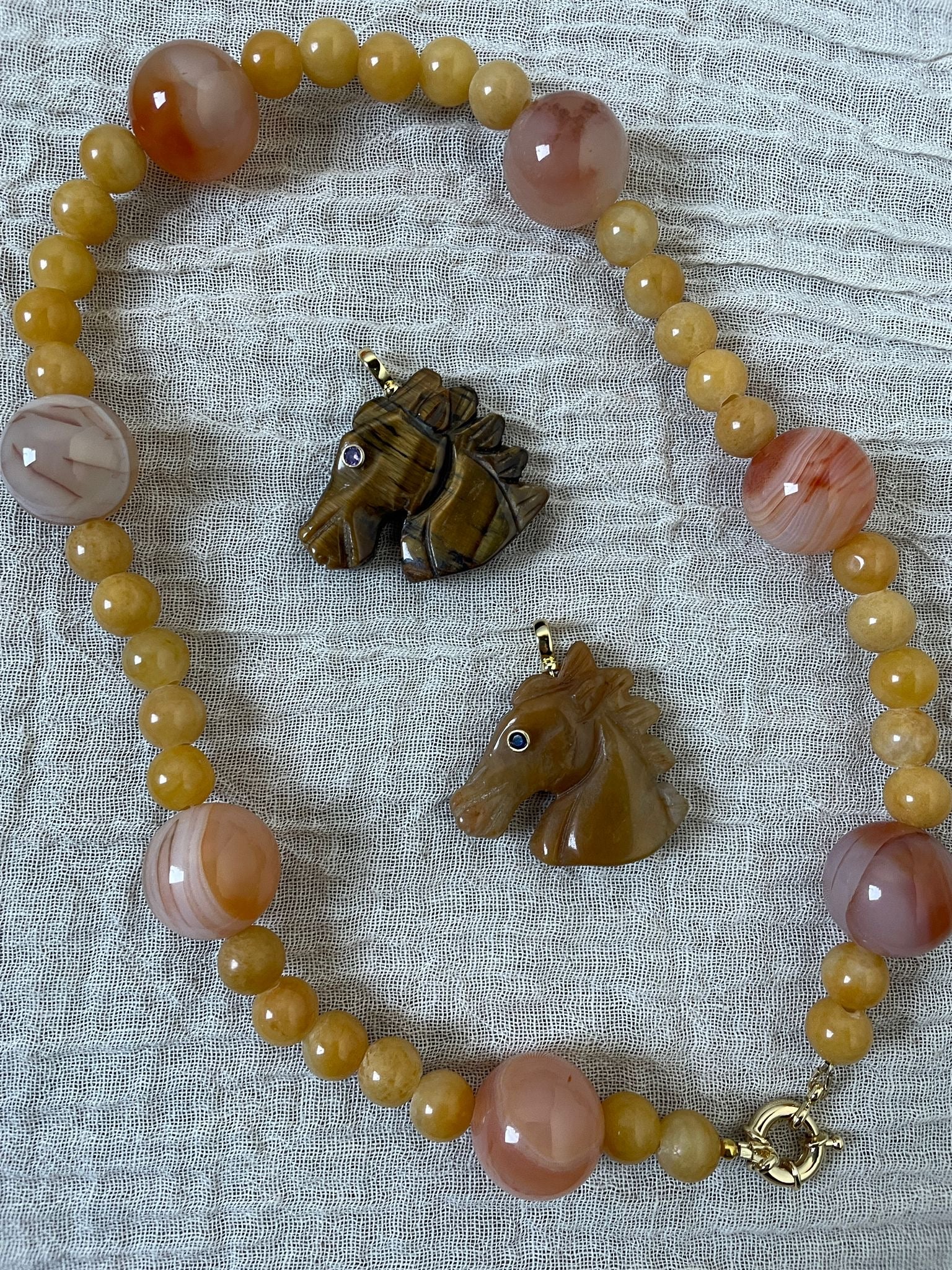 Payment for necklace and 2 horse pendants